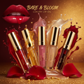 Bare & Bloom Glow Lip Oil in 5 shades with dramatic jewel-tone backdrop