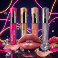 Bare & Bloom Plumping Gloss in 4 shades with dramatic jewel-tone backdrop