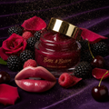 Bare & Bloom Overnight Lip Mask jar with berries and gold accents on dark velvet
